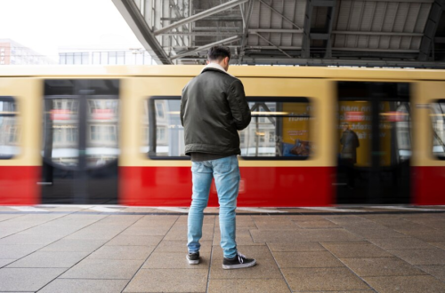 man waiting for train