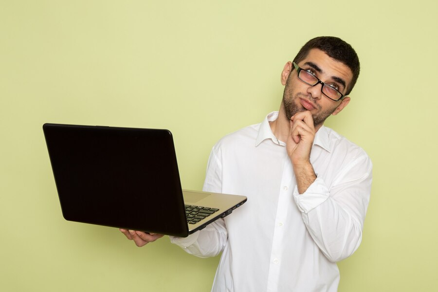 Man holding a laptop